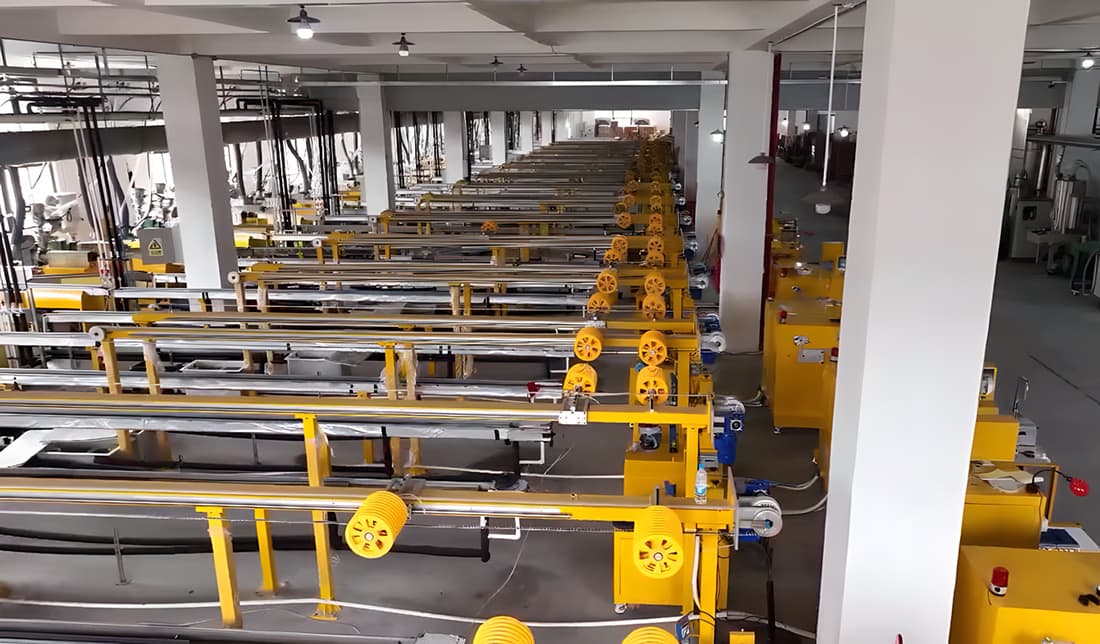 PLA PETG filament cooling trough OEM Foshan — long yellow cooling paths on the extrusion line at Qianshuo source factory